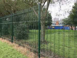 Paladin and stripe panel mesh fencing system for secure perimeter protection